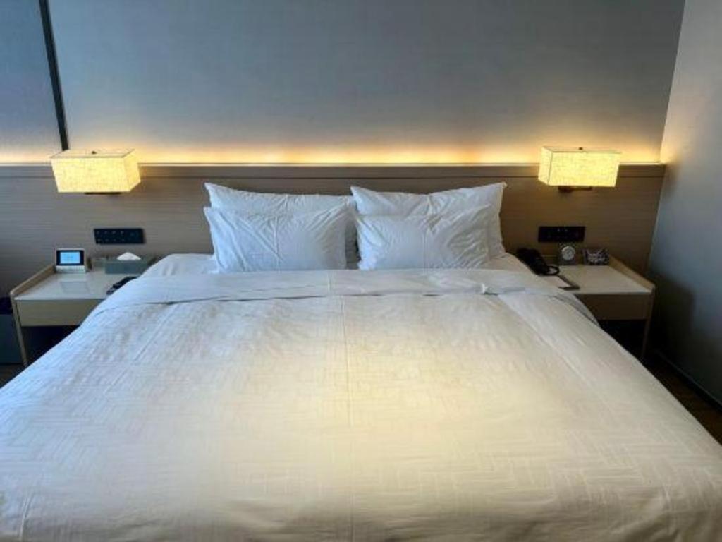 Zhangjiagang Jiangnan Garden Hotel Extérieur photo