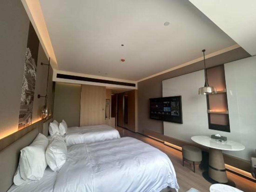 Zhangjiagang Jiangnan Garden Hotel Extérieur photo