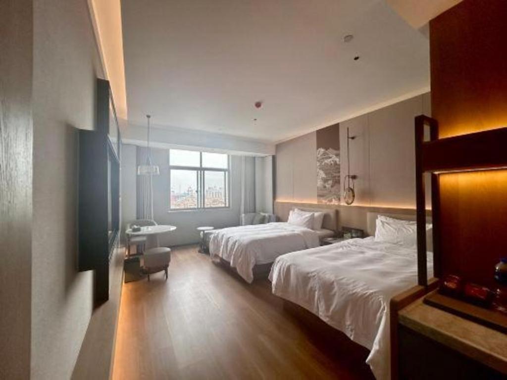 Zhangjiagang Jiangnan Garden Hotel Extérieur photo